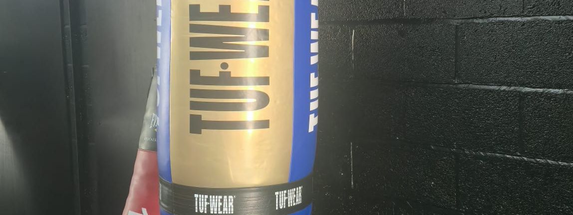 A blue and gold TUF-WEAR heavy bag at MPL Box Fit