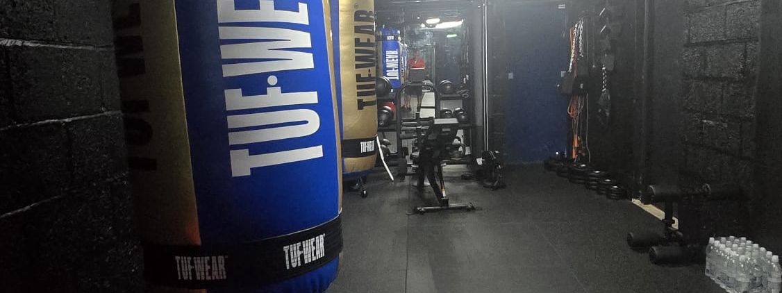 TUF-WEAR heavy bags and the training floor at MPL Box Fit